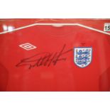 Geoff Hurst signed framed football shirt and montage, overall 84 x 58 cm, with COA from Montage