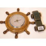 Vintage barometer with ships wheel design and a vintage wooden racing car. P&P Group 1 (£14+VAT