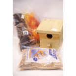 Aquarium pump, gravel, etc and a wooden bird box. P&P Group 2 (£18+VAT for the first lot and £2+