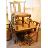 Extending vintage oak dining table with 4 matching chairs. This lot is not available for in-house