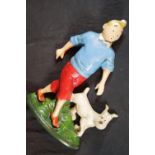 Cast iron Tin Tin and dog doorstop, H: 30 cm. P&P Group 2 (£18+VAT for the first lot and £2+VAT