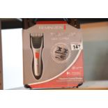Cased Remington titanium hair clipper. P&P Group 1 (£14+VAT for the first lot and £1+VAT for