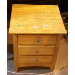 Beech three drawer bedside table. This lot is not available for in-house P&P, please contact the