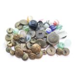 Box of vintage military and RAF brass buttons and antique glass marbles. P&P Group 1 (£14+VAT for