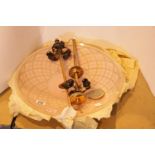 Pair of 1950s pink glass dish shape ceiling lights with three bulb brass fittings. Not available for