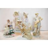 Five Continental porcelain figurines. P&P Group 3 (£25+VAT for the first lot and £5+VAT for