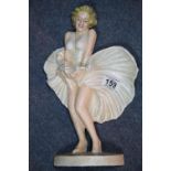 SOLD FOR THE NHS Cast iron Marilyn Monroe door stop, H: 34 cm. P&P Group 2 (£18+VAT for the first