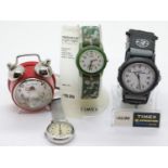 Two new Timex wristwatches and a Royal nurses watch. P&P Group 1 (£14+VAT for the first lot and £1+