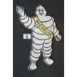 Cast iron Michelin man plaque, H: 34 cm. P&P Group 2 (£18+VAT for the first lot and £2+VAT for