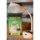 New small table magnifying lamp. P&P Group 2 (£18+VAT for the first lot and £2+VAT for subsequent