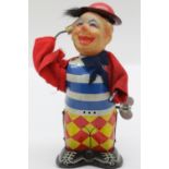 Japanese tin plate toy clown figurine, H: 10 cm. P&P Group 1 (£14+VAT for the first lot and £1+VAT