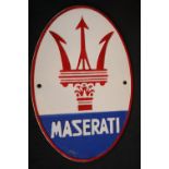 Cast iron Maserati wall plaque, L: 29 cm. P&P Group 2 (£18+VAT for the first lot and £2+VAT for