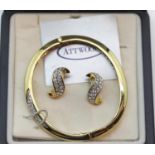 Boxed Attwood yellow metal and diamante matching earring and bracelet set. P&P Group 1 (£14+VAT