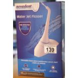 Boxed Nevadent water jet flosser. P&P Group 1 (£14+VAT for the first lot and £1+VAT for subsequent