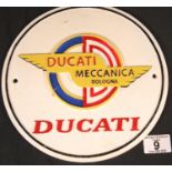 Cast iron Ducati sign, D: 20 cm. P&P Group 2 (£18+VAT for the first lot and £2+VAT for subsequent