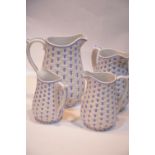 Set of four blue and white graduated basket weave effect jugs, tallest H: 23 cm. P&P Group 3 (£25+