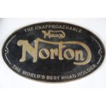 Cast iron Manx Norton plaque, D: 24 cm. P&P Group 2 (£18+VAT for the first lot and £2+VAT for