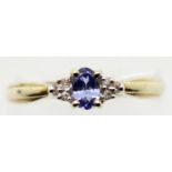 Ladies 9ct gold fancy tanzanite and diamond ring, size Q, 2.0g. P&P Group 1 (£14+VAT for the first