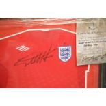 Geoff Hurst signed framed football shirt and montage, overall 84 x 58 cm, with CoA from Montage