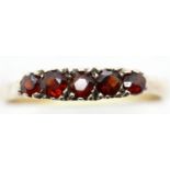 9ct gold 1970s five stone garnet ring, size S, 2.0g. P&P Group 1 (£14+VAT for the first lot and £1+