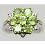 925 silver peridot type stone set ring, size R/S, 5g. P&P Group 1 (£14+ VAT for the first lot and £