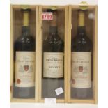 Three bottles of red wines: 2 x chateau Roc du Creuzelat Lussac Saint Emilion 2010 and Chateau Petit