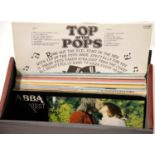 Box of approximately thirty 20thC Top of the Pops LP records and others. This lot is not available