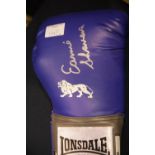 Earnie Shavers signed blue Lonsdale boxing glove with CoA from Montage Moments. P&P Group 2 (£18+VAT