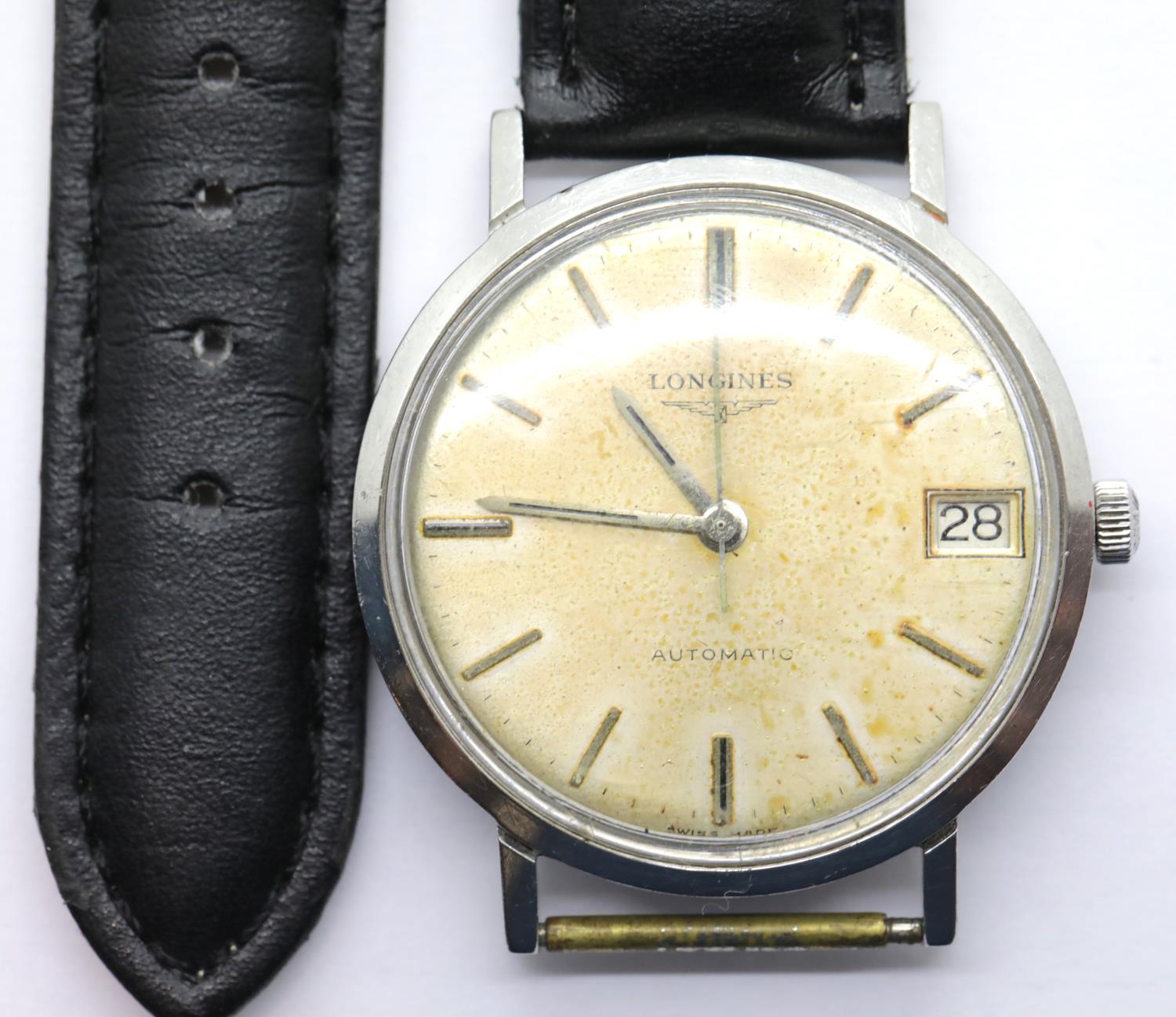 1960s Longines gents automatic date wristwatch with unusual movement on a leather strap. Working