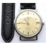 1960s Longines gents automatic date wristwatch with unusual movement on a leather strap. Working