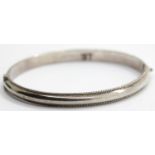 Ladies 925 silver rope edged fancy bangle, D: 65 mm, 9.9g. P&P Group 1 (£14+VAT for the first lot