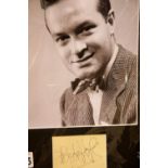 Bob Hope, framed signature with publicity shot photograph, 24 x 19 cm, with no CoA. P&P Group 2 (£