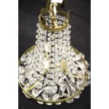Medium size crystal chandelier, H: 40 cm. This lot is not available for in-house P&P, please contact