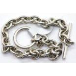 Silver solid oval link T-bar bracelet, L: 17.5 cm, 12.5g. P&P Group 1 (£14+VAT for the first lot and