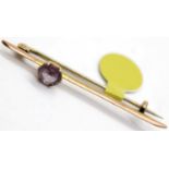 Antique 9ct rose gold amethyst bar brooch, L: 48 mm, 1.6g. P&P Group 1 (£14+VAT for the first lot
