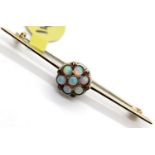 Ladies antique 9ct gold opal seven stone daisy cluster brooch, L: 5 cm, 3.2g. P&P Group 1 (£14+VAT