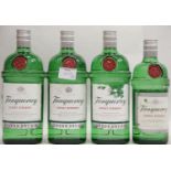 Four bottles of Tanqueray London dry gin 3 x ltr and 1 x 70cl. P&P Group 3 (£25+VAT for the first