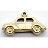 9ct gold 1970s classic car charm, L: 19mm, 0.6g. P&P Group 1 (£14+VAT for the first lot and £1+VAT