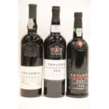 Three bottles of Taylor's vintage Port: late bottled 2009, late bottled 1989 and bottled 2000, all