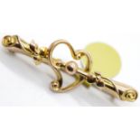 Antique 9ct rose gold ornate heart brooch, L: 42 mm, 1.9g. P&P Group 1 (£14+VAT for the first lot