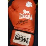 Ken Buchanan signed red Lonsdale boxing glove with CoA from Montage Moments. P&P Group 2 (£18+VAT