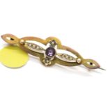 Antique 9ct gold, amethyst and seed pearl brooch, L: 4.5 cm, 2.2g. P&P Group 1 (£14+VAT for the