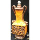 Large West German drip glaze reticulated table lamp with twin mask handles, H: 70 cm. This lot is