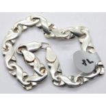 Ladies silver fancy solid link bracelet, L: 18.5 cm. P&P Group 1 (£14+VAT for the first lot and £1+