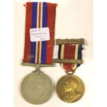 The Kings medal (1919-1920) to A Puncher and a WWII service medal. P&P Group 1 (£14+VAT for the