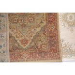 Red and brown floral ground rug, L: 2.3m, W: 1.2m. This lot is not available for in-house P&P,