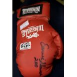 Earnie Shavers 2010 signed red Lonsdale boxing glove with no CoA. P&P Group 2 (£18+VAT for the first