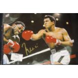 Mohammed Ali autographed colour publicity shot, signed in gold pen, 25 x 20 cm, with CoA from VS