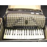 Hohner Atlantic IIIP accordion with damage to front cover and all keys releasing. P&P Group 3 (£25+