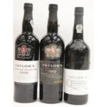 Three bottles of Taylor's vintage Port: late bottled 2009, late bottled 1995 and bottled 1990. all